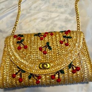 Cute straw purse with cherries